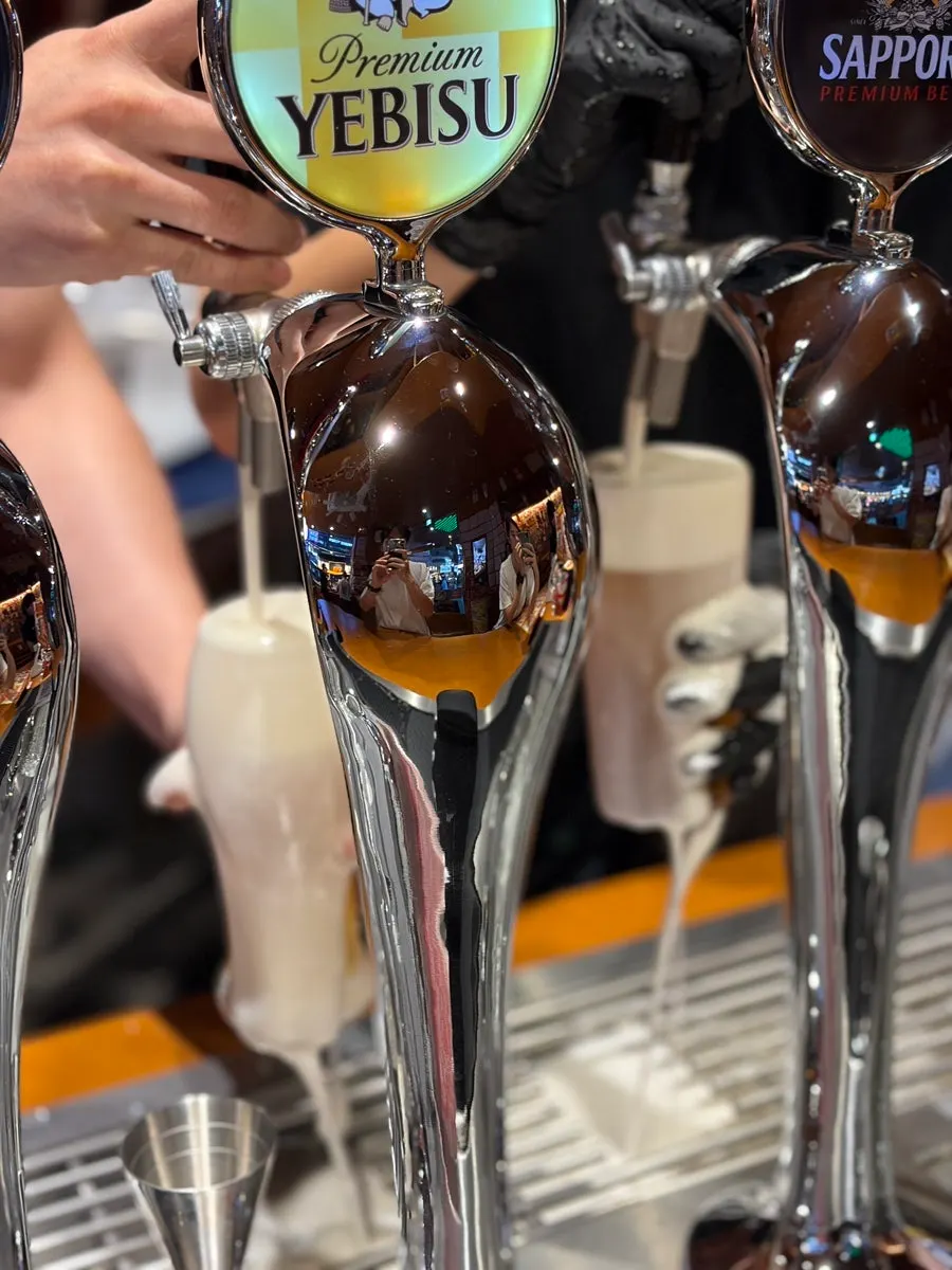 Draft beer dispenser pouring a beer