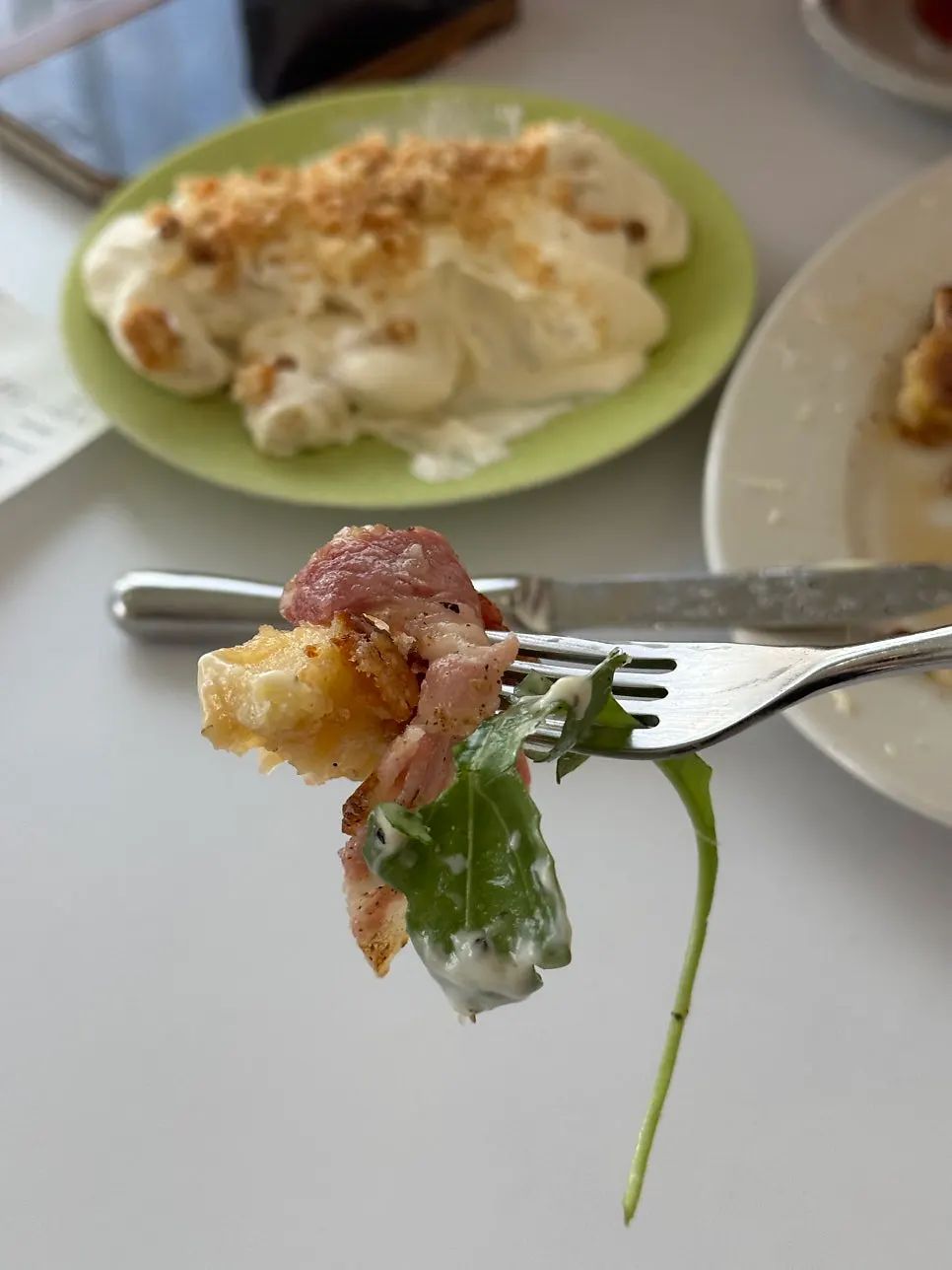 A forkful of corn bacon French toast