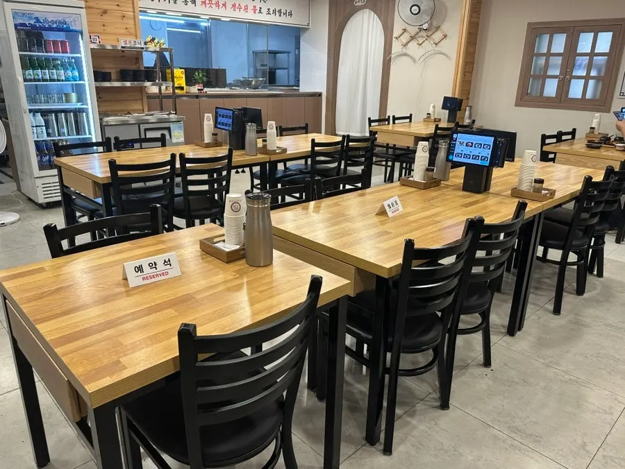 Neat main dining area at Yongho Dwaeji Gukbap