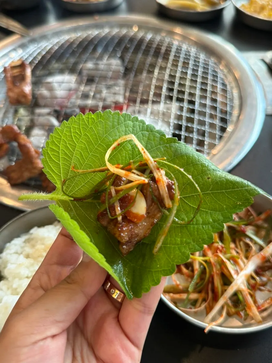 Pork ribs placed on a lettuce wrap