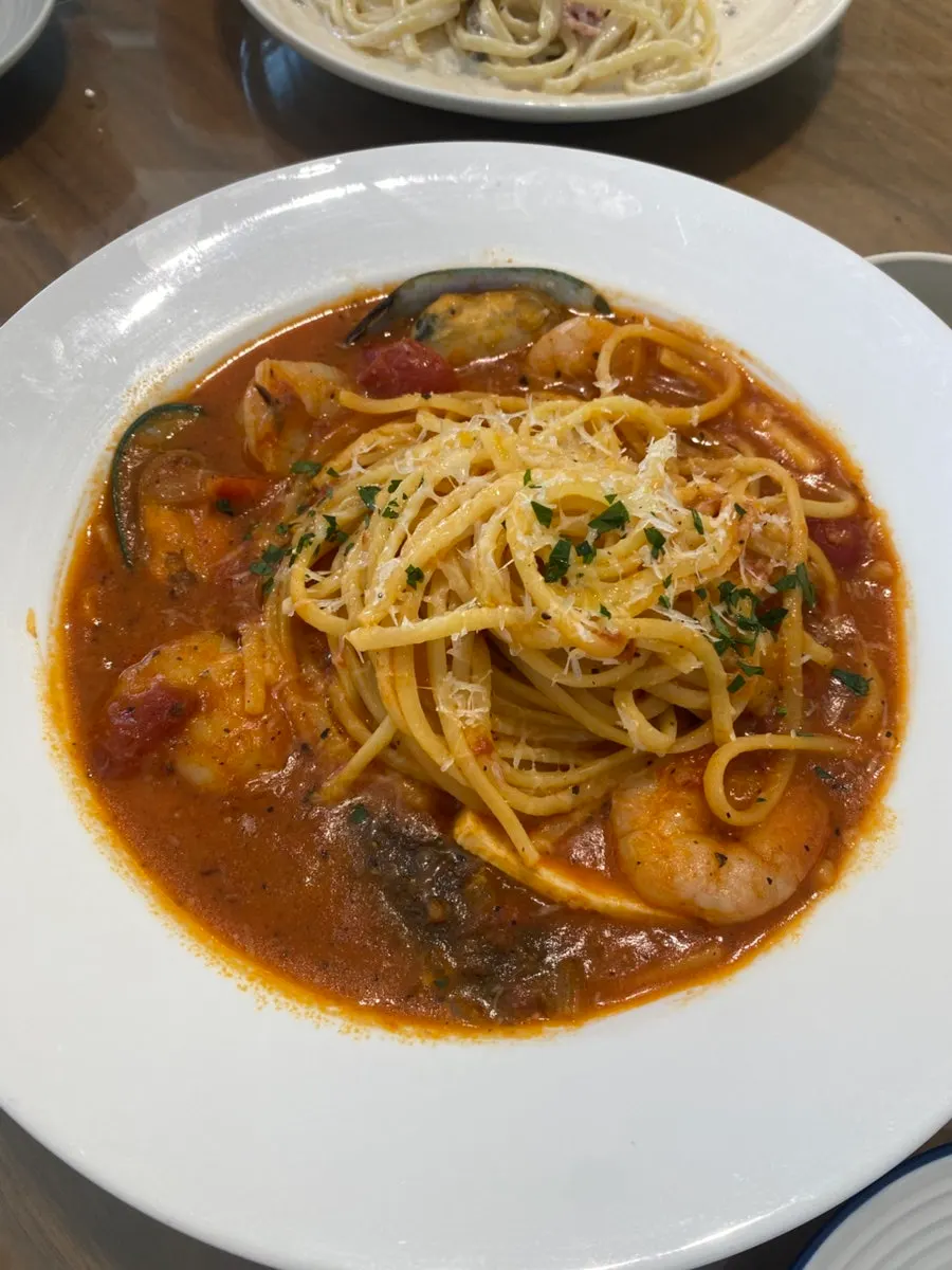 Close-up of cream pasta served in a panne bread bowl