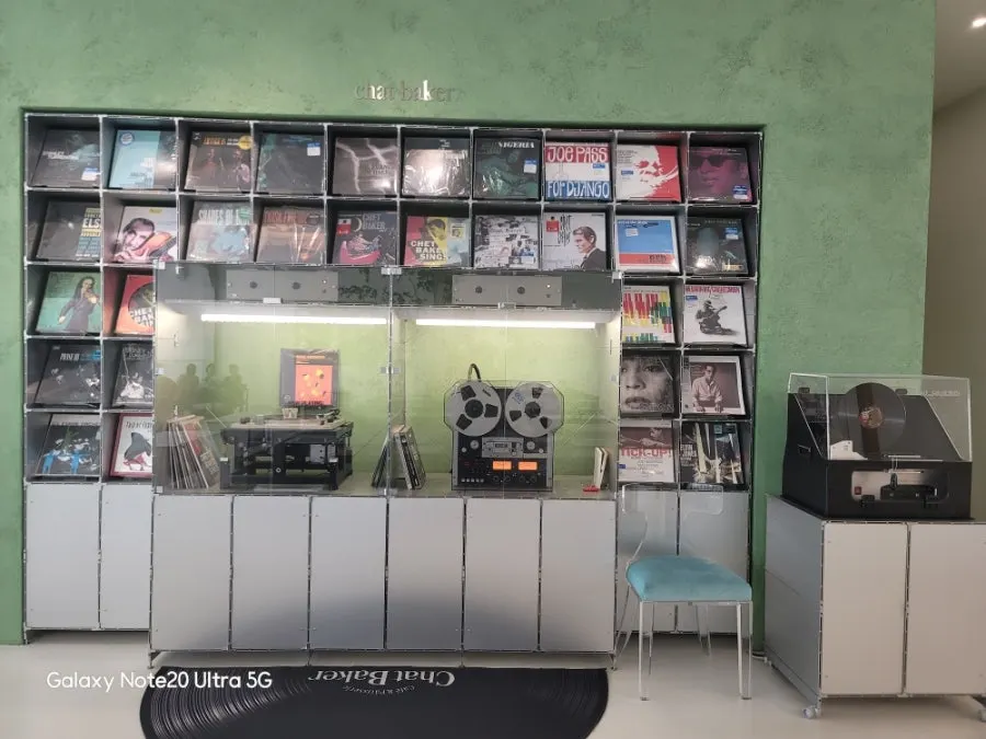 Wall covered with LP records and vintage sound equipment