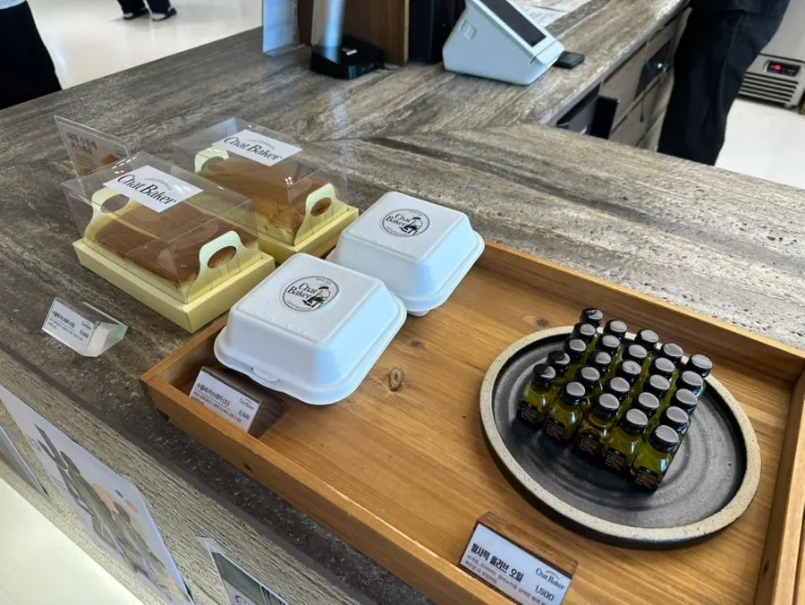 Seasonal fruit cake showcase next to the counter