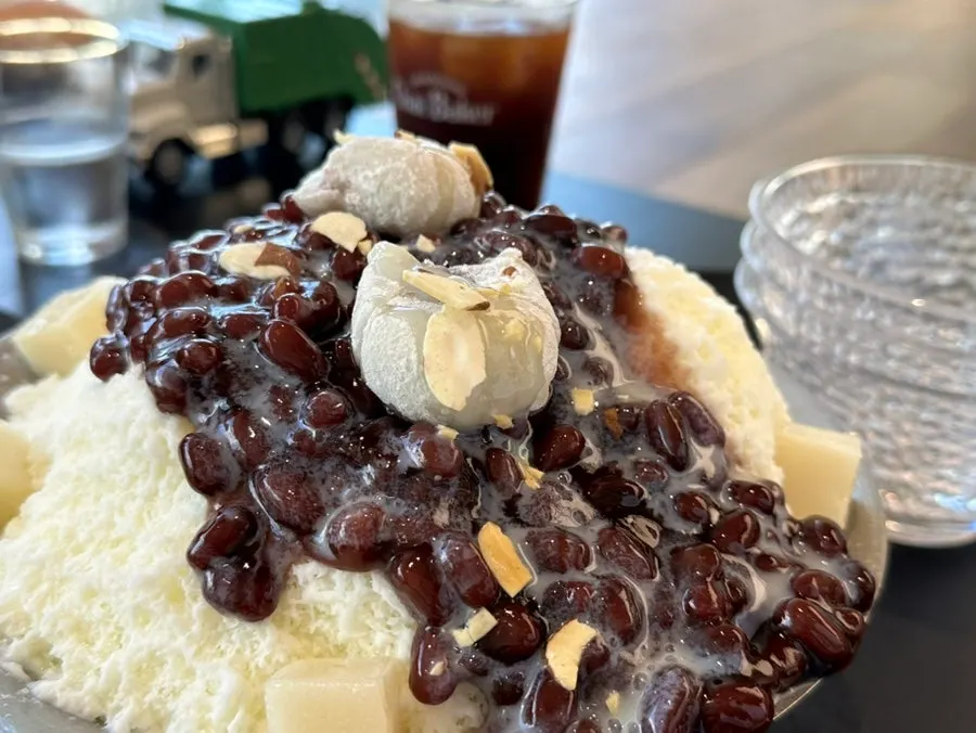 Red beans dripping down the snow-flake ice