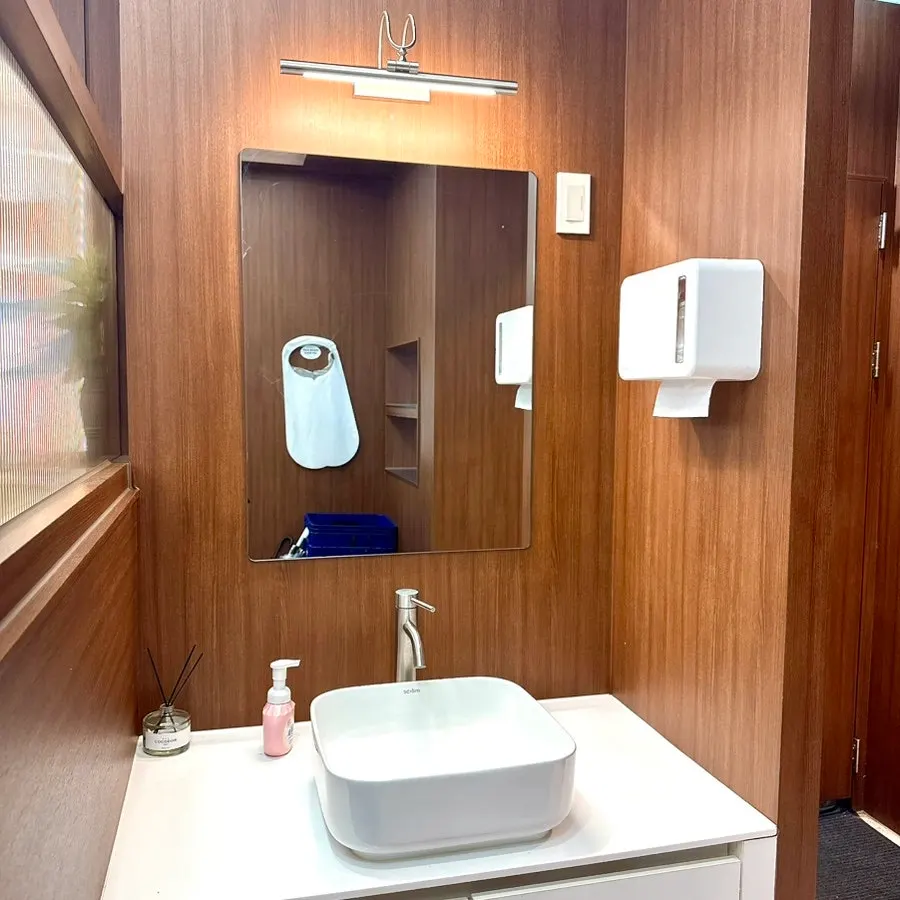 Sink and restroom entrance set up inside the restaurant