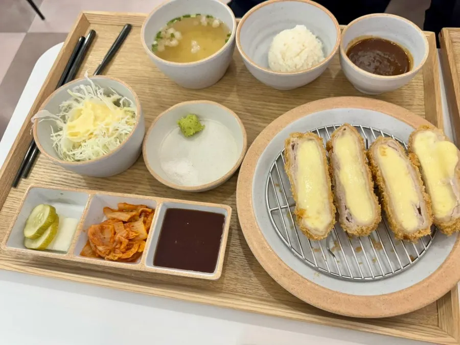 Cheese-loaded katsu set piled high with cheese