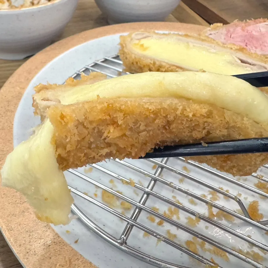 Close-up of the cheese-loaded katsu
