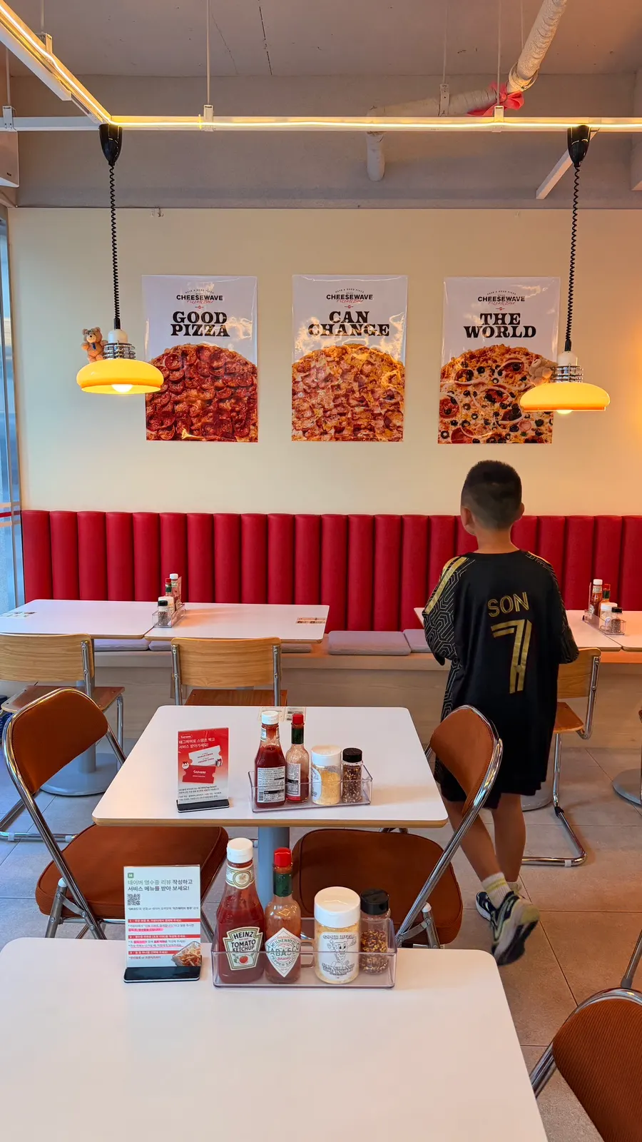 Wall with pizza posters
