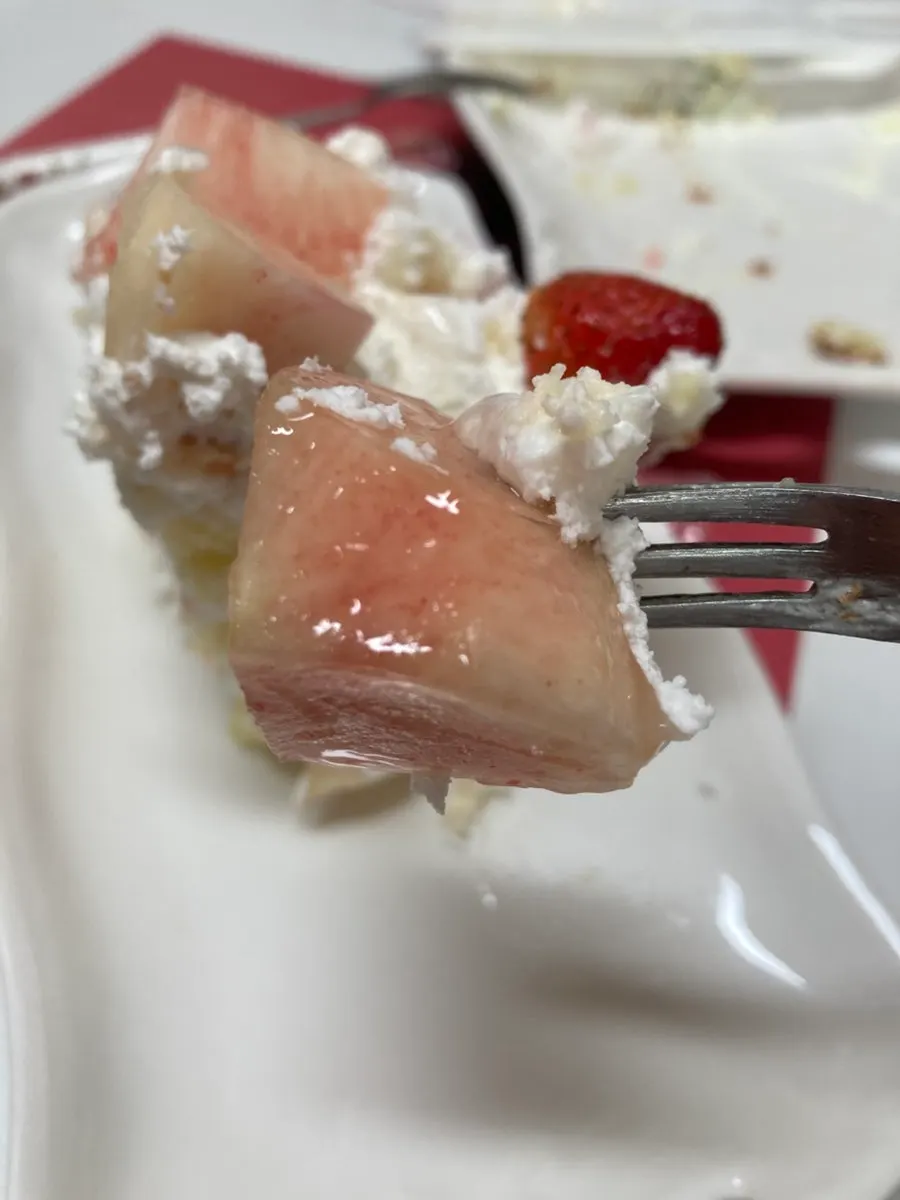 A slice of the Peach Berry cake plated