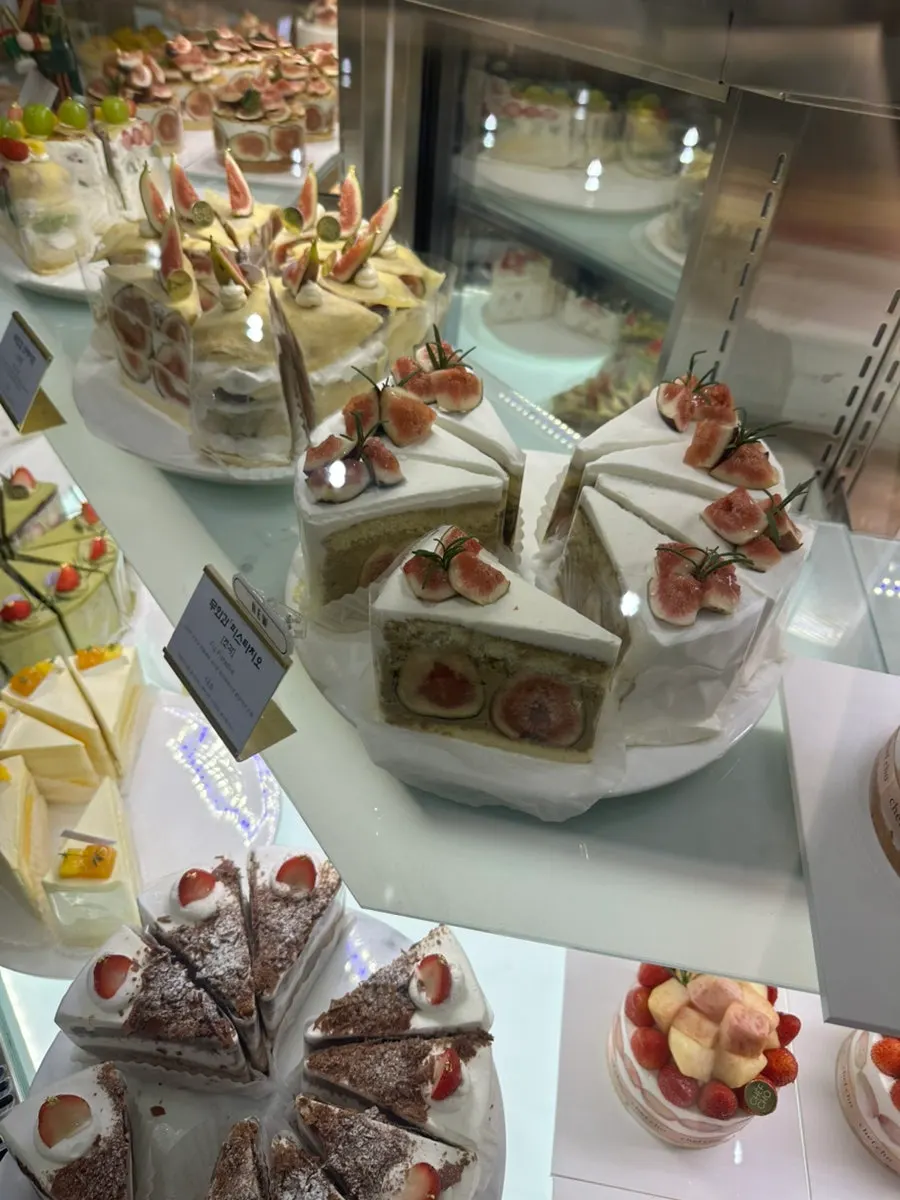 The purchased Chef Cho mango cake and fig pistachio slice