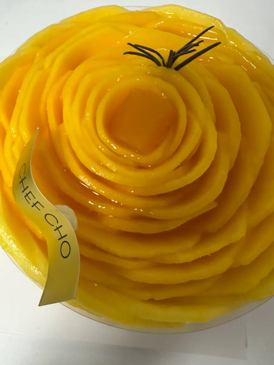 Mango slices layered like a flower on top