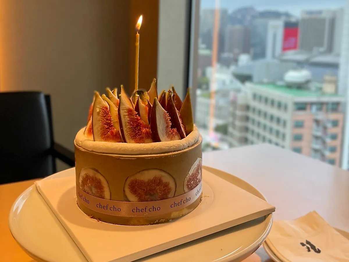 Front view of Chef Cho's whole fig pistachio cake