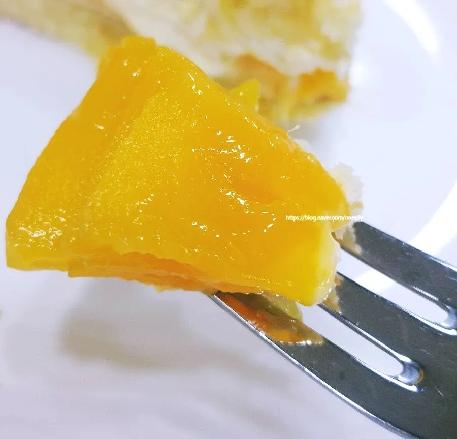Cross-section of the sliced Real Mango Rose cake