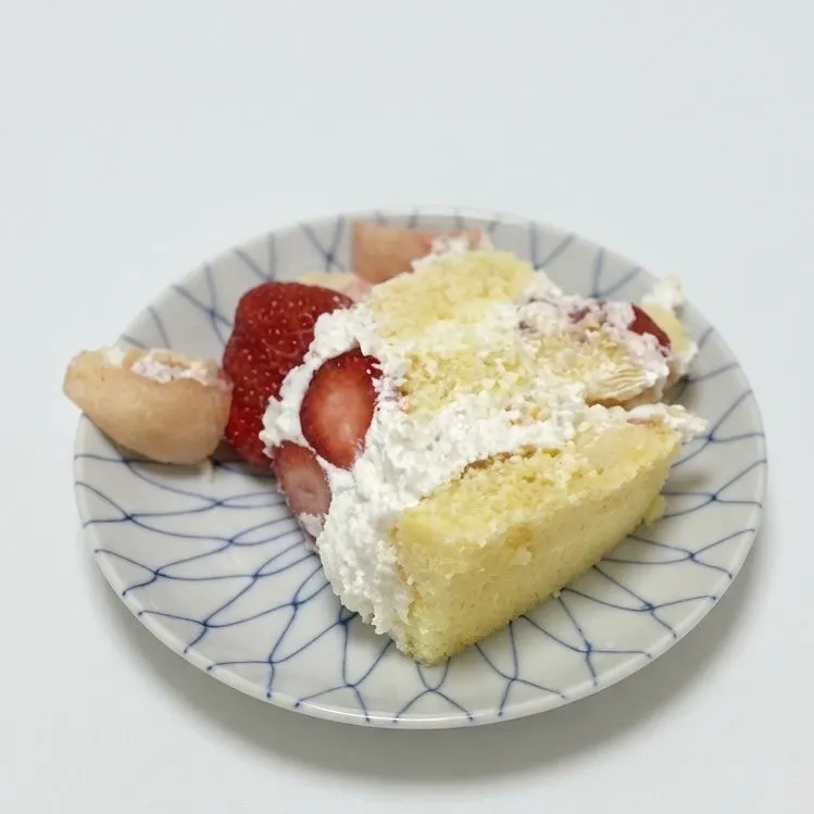 A slice of Peach Berry cake plated