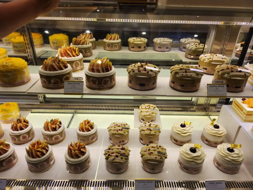 Various Chef Cho cakes on display