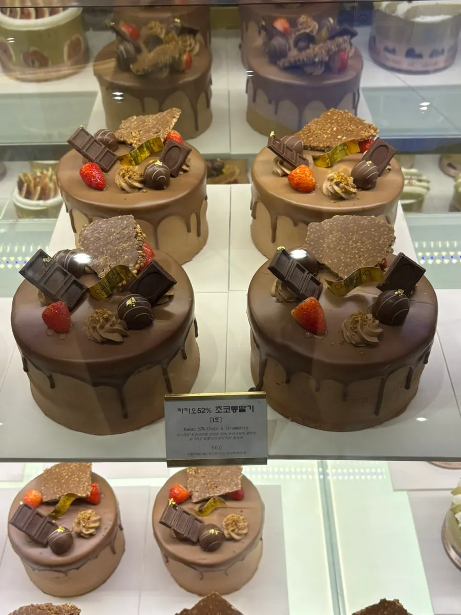 Fresh fruit cream cakes displayed in the Chef Cho showcase