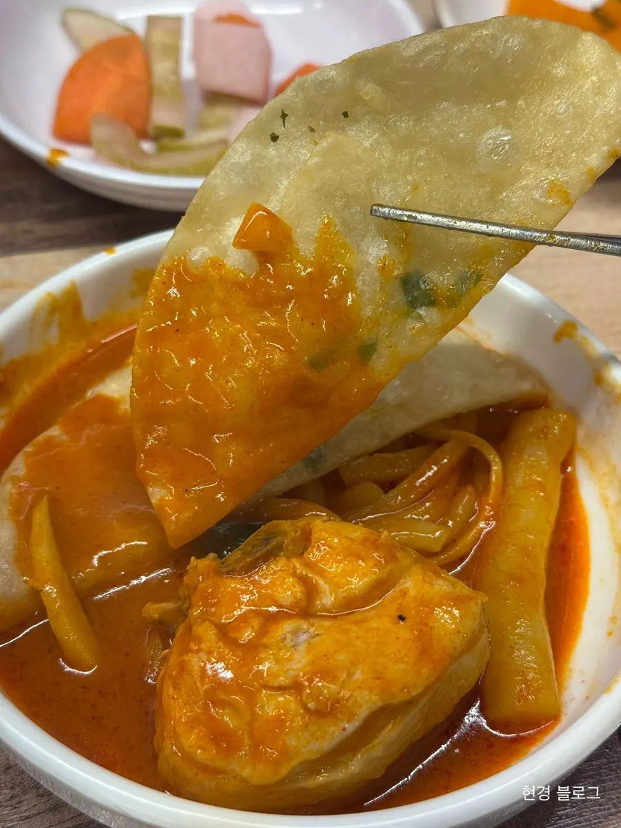 Udon noodles coated in spicy sauce