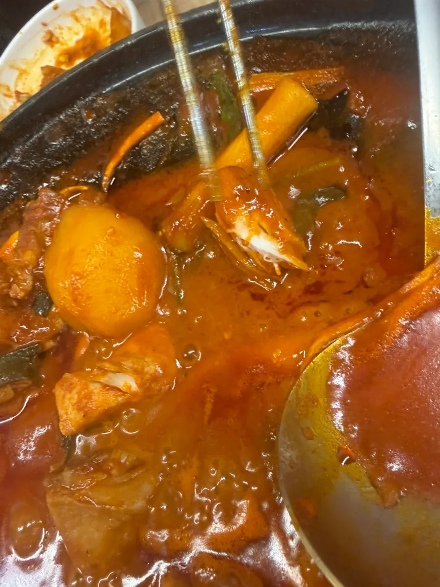 Meal with chicken drumstick and egg