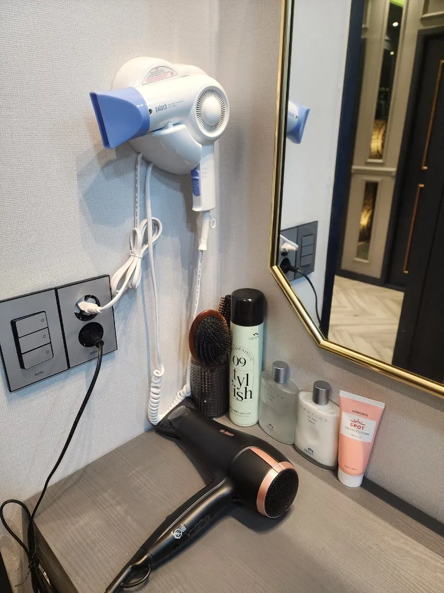 Shower area stocked with shower amenities