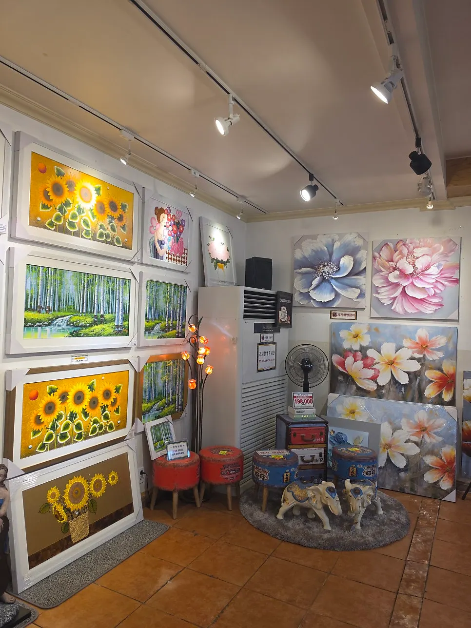 Oil paintings decorating the first-floor wall