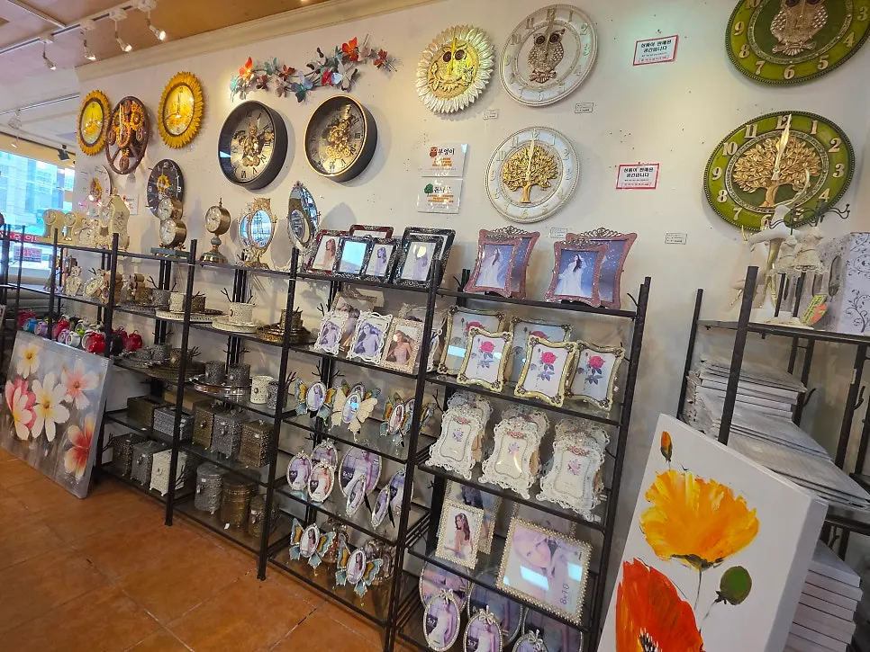 A corner displaying pretty frames and trivets