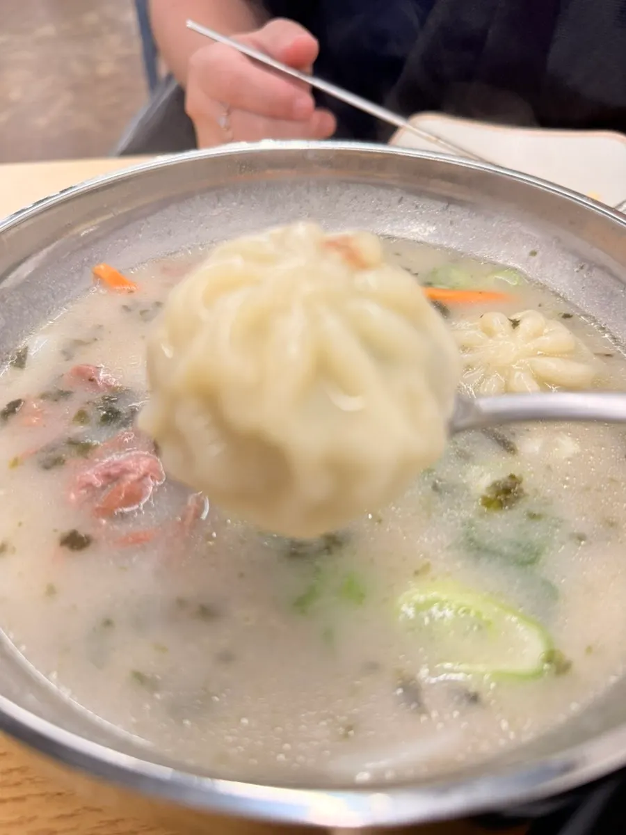 Gopchang Wangchang Saengyuk Kalmyeon with chewy rice cakes