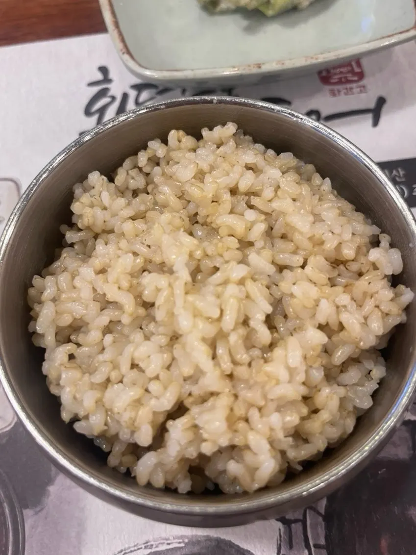 A bowl of brown rice, chosen from the rice options