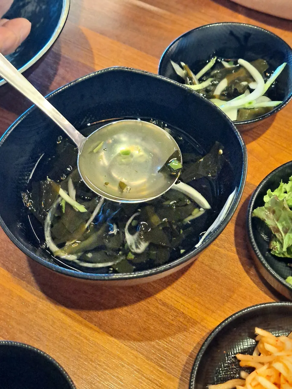 Spread of banchan served after ordering