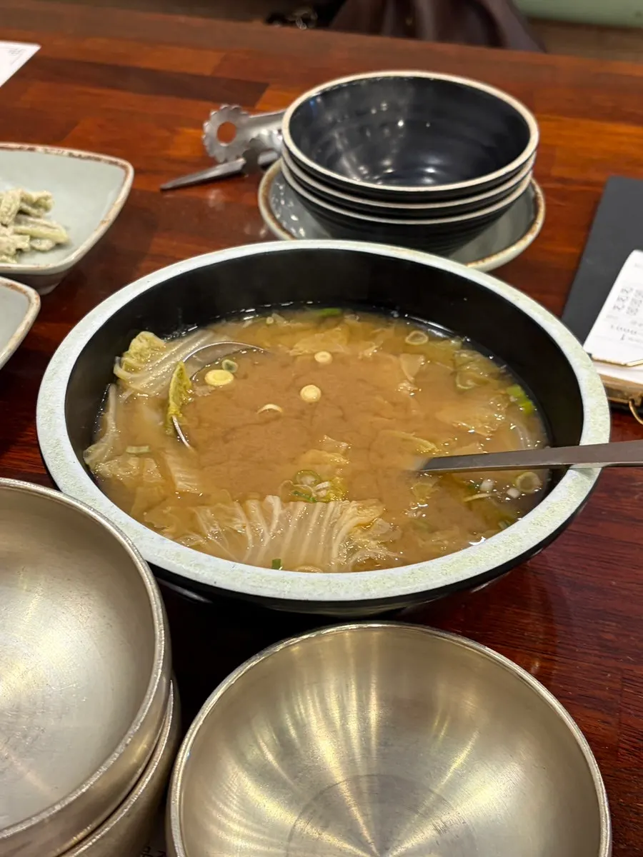 Basic side dish spread with altari kimchi and japchae