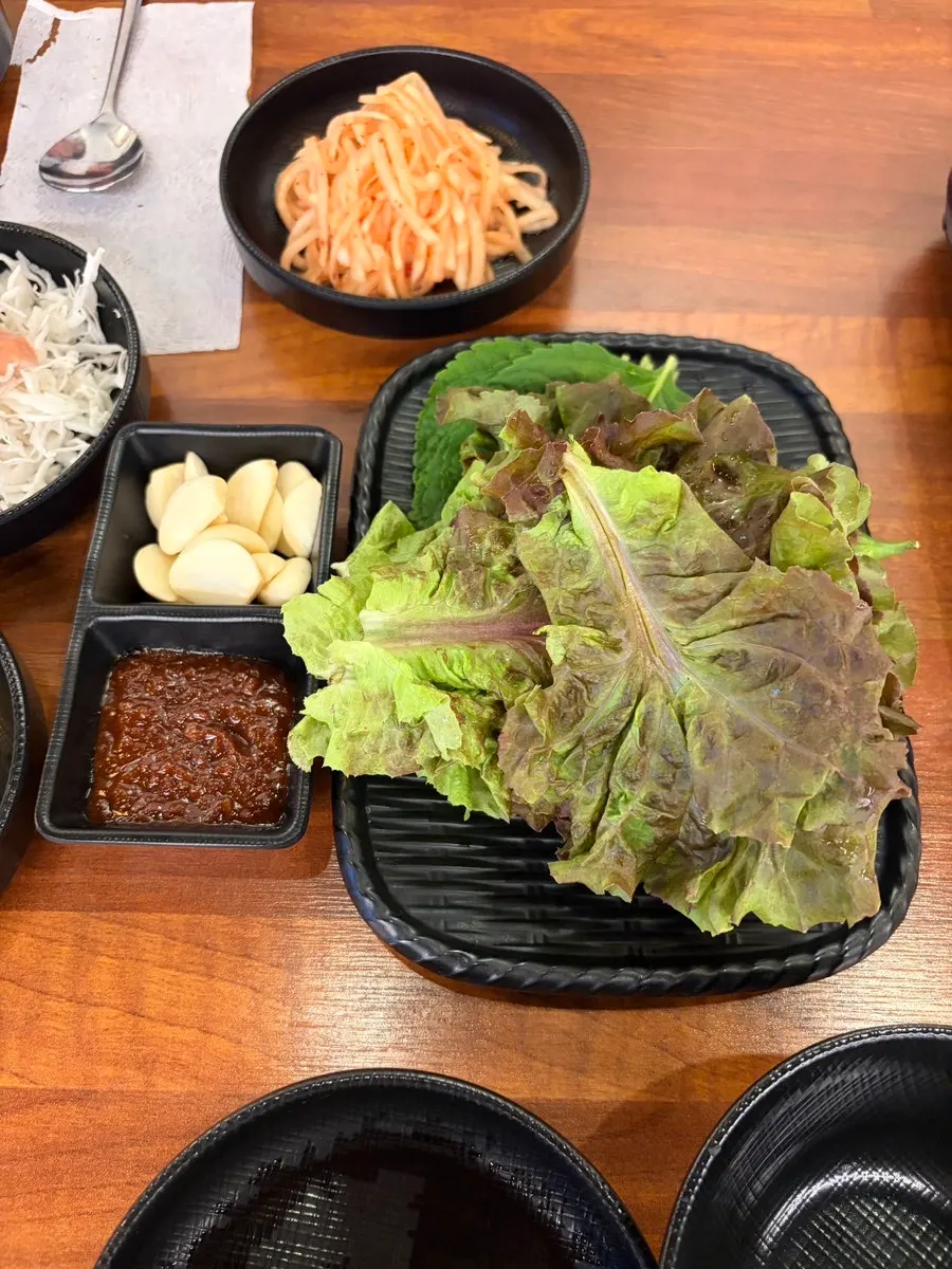 Lettuce and perilla wrap greens with ssamjang and garlic