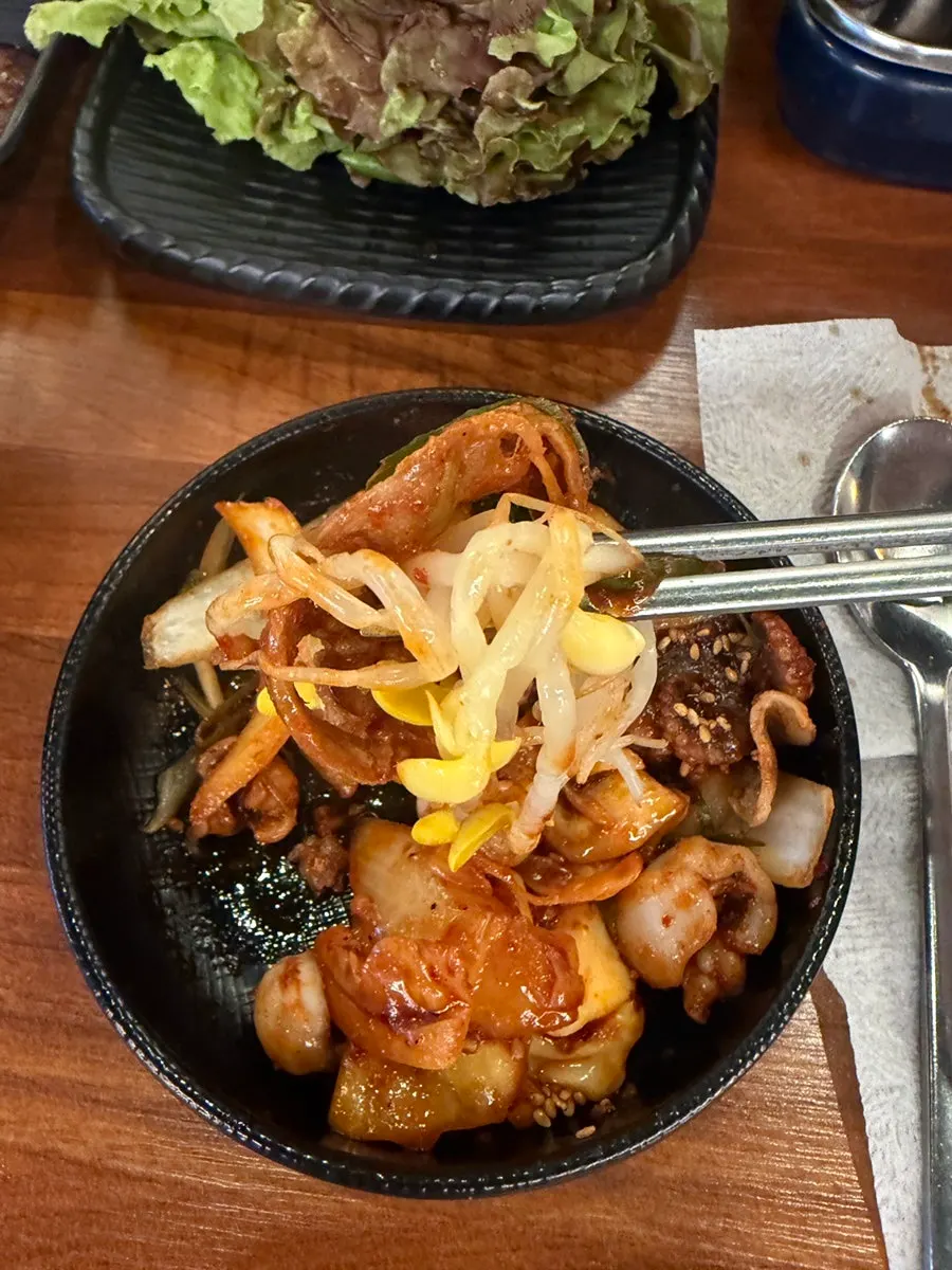 Jjukkumi samgyeopsal mixed with banchan like bibimbap