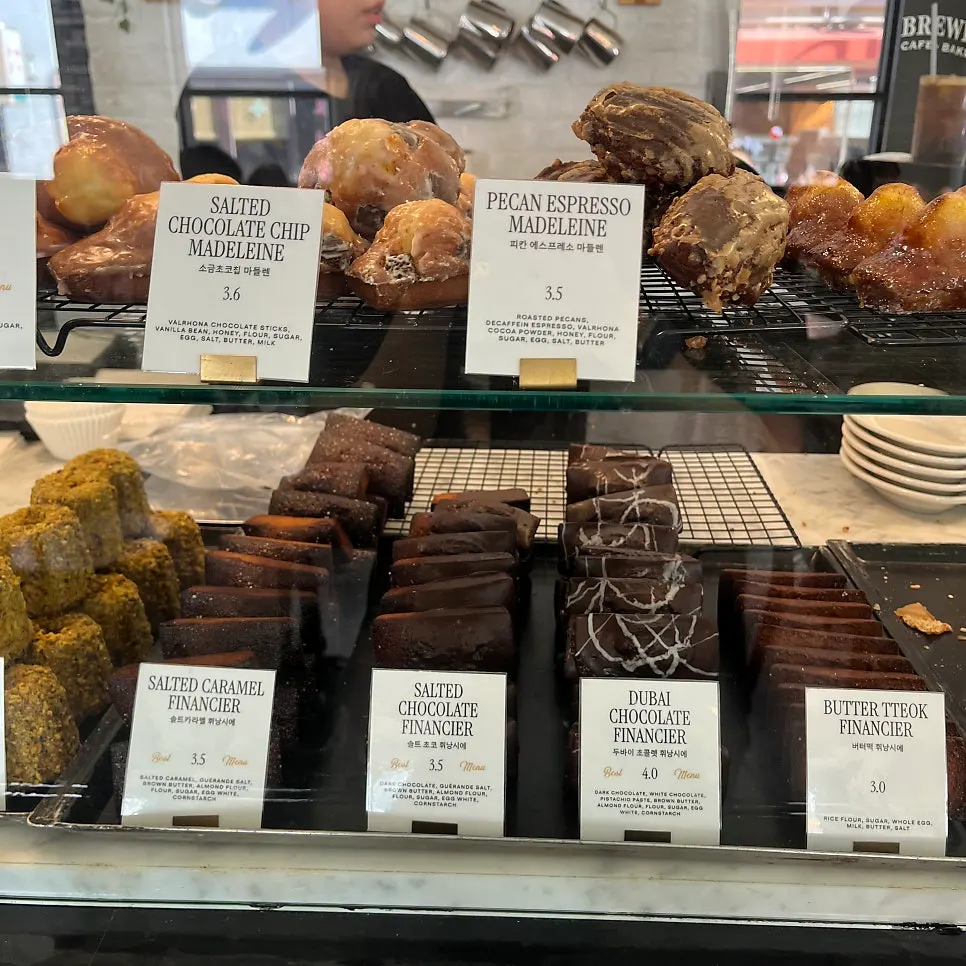 A variety of baked treats including canelés