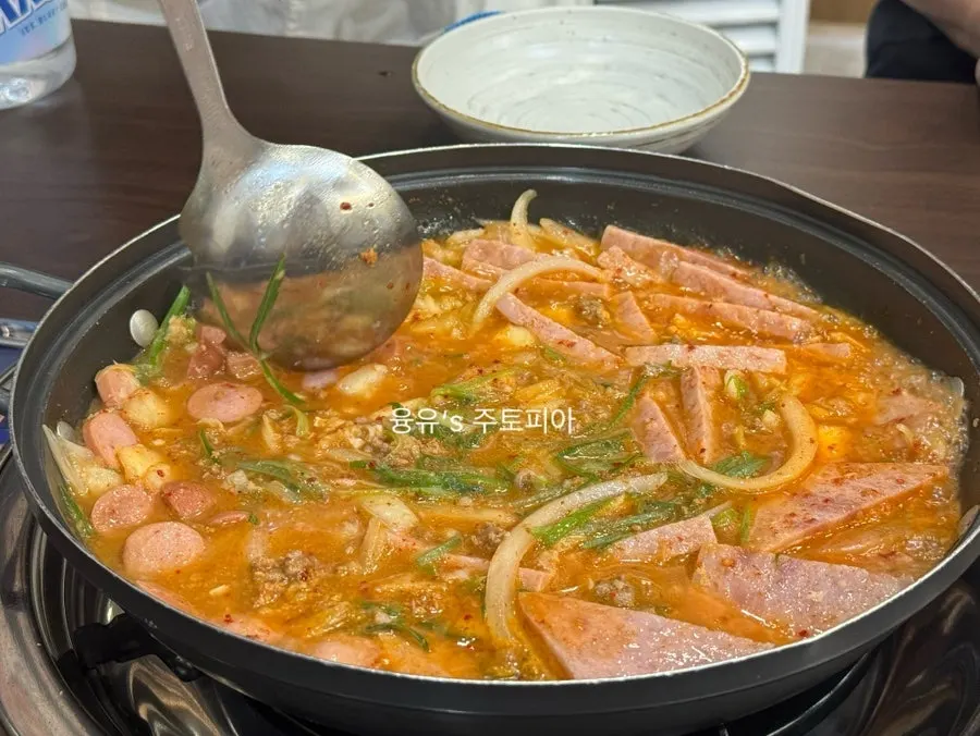Budae-jjigae table spread