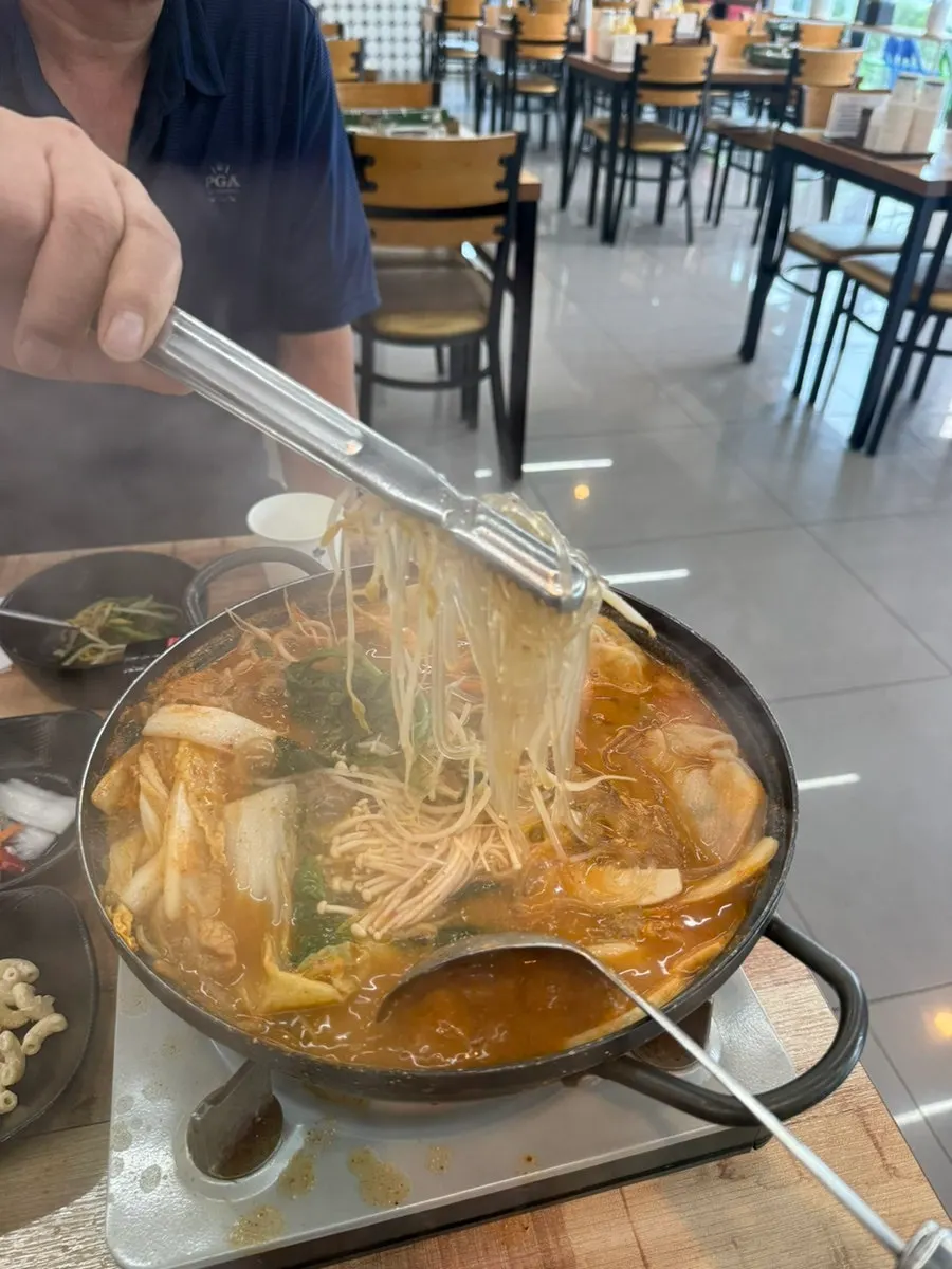 Generous dumpling hot pot beginning to boil