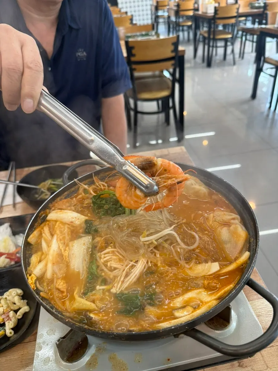 Dumpling hot pot with vegetables and glass noodles
