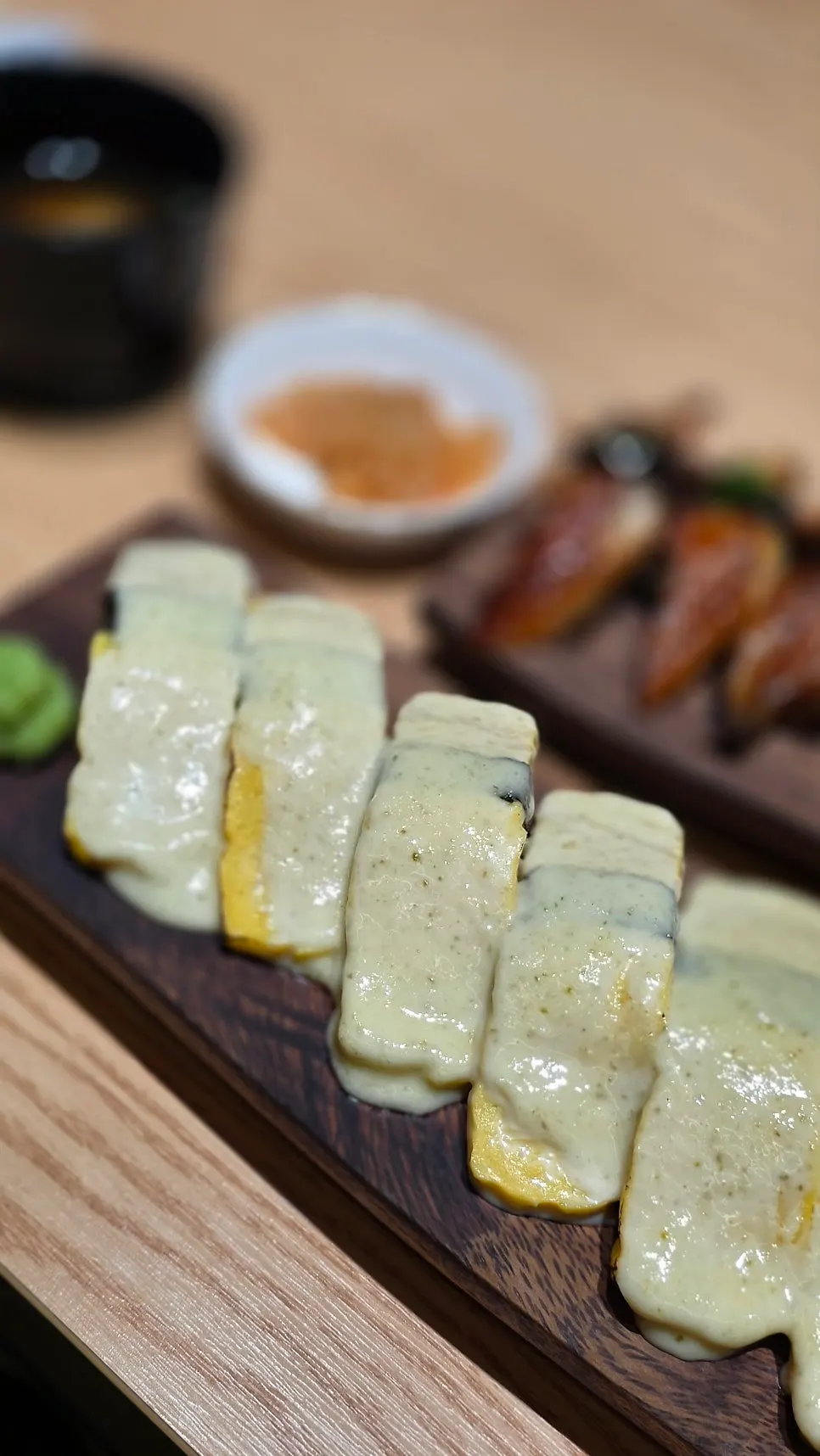 Order of freshwater eel sushi and flame-seared sushi