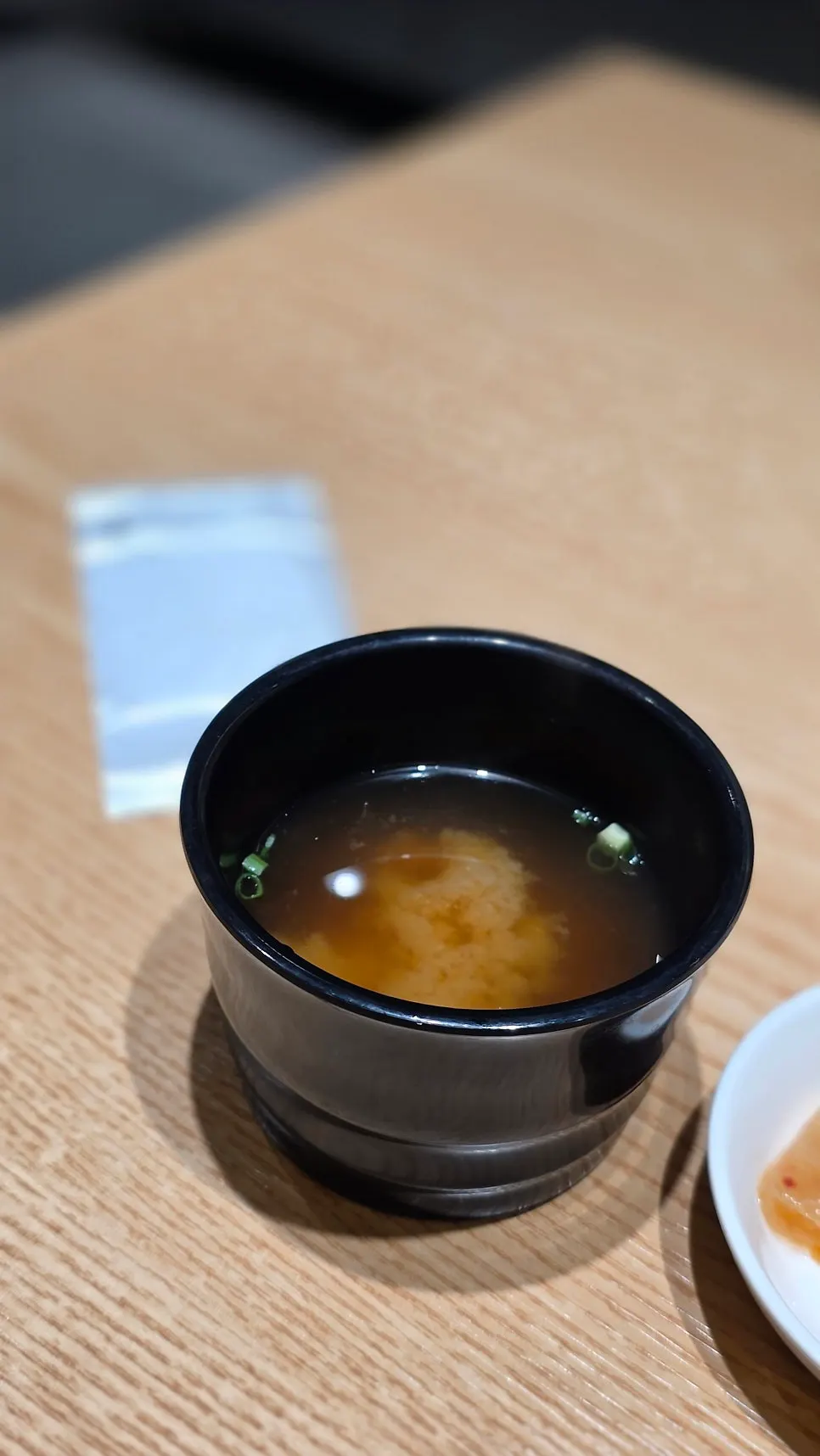 Table with sushi and mini udon together