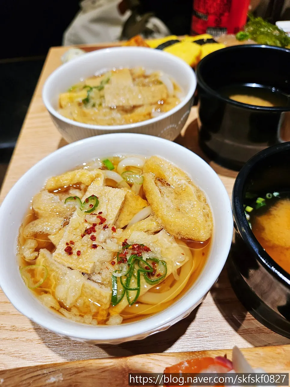 Mini udon served alongside the sushi