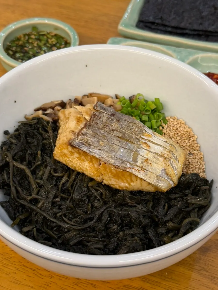 Full table set with hanpan galbi, mackerel gondre rice, and yukhoe bibimbap
