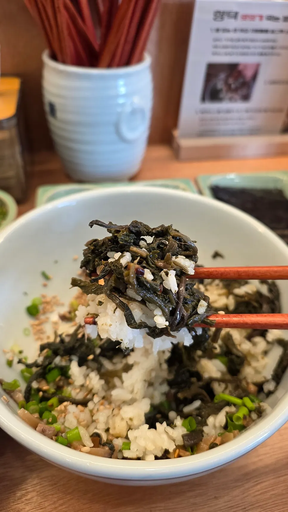 A Korean meal with mackerel, gondre rice, and hanpan galbi