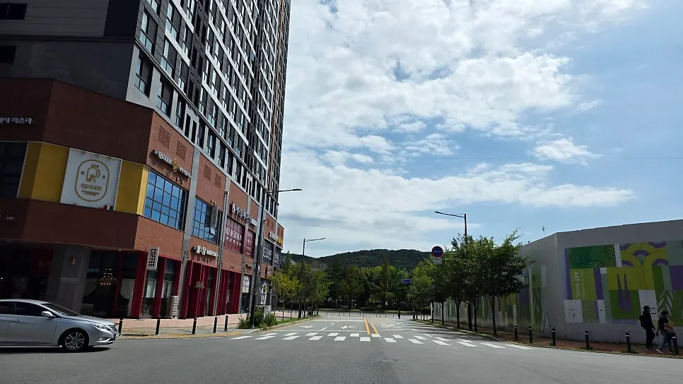 The front of Hyangtaek with its large wooden sign