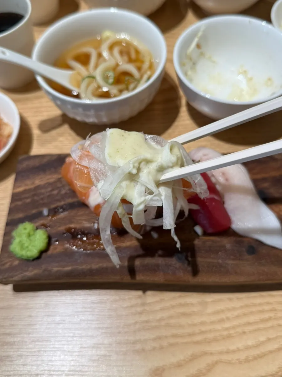 Flounder fin sushi topped with aged kimchi