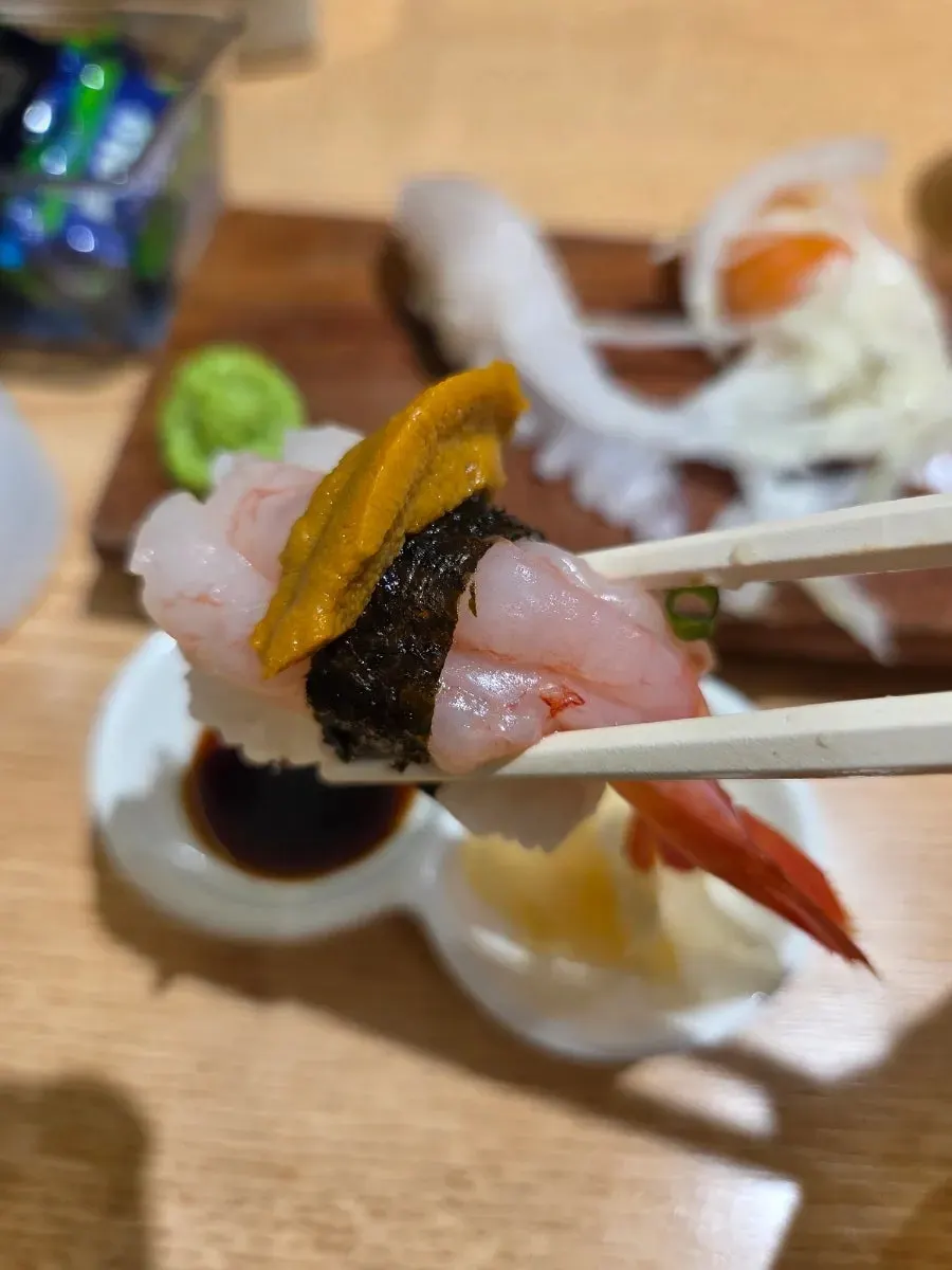 A variety of sushi including shrimp sushi