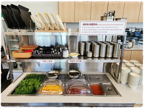 Self-service bar with lettuce-wrap vegetables and side dishes