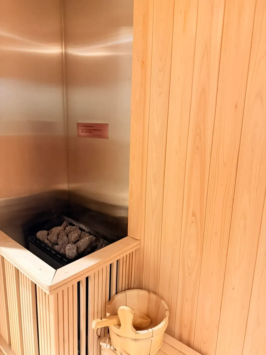 Interior of the cozily decorated one-person sauna room