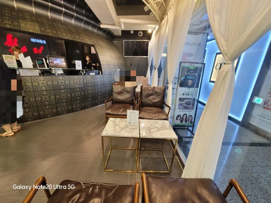 Café-like waiting area with a plush sofa