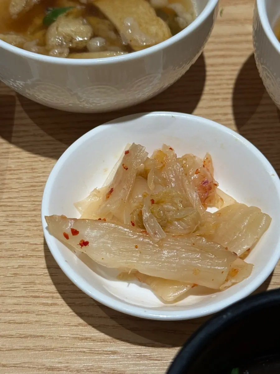 Seafood croquette enjoyed between sushi pieces