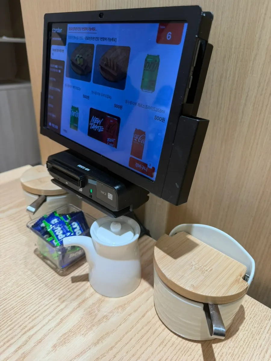 Neatly organized tableware in the table drawer