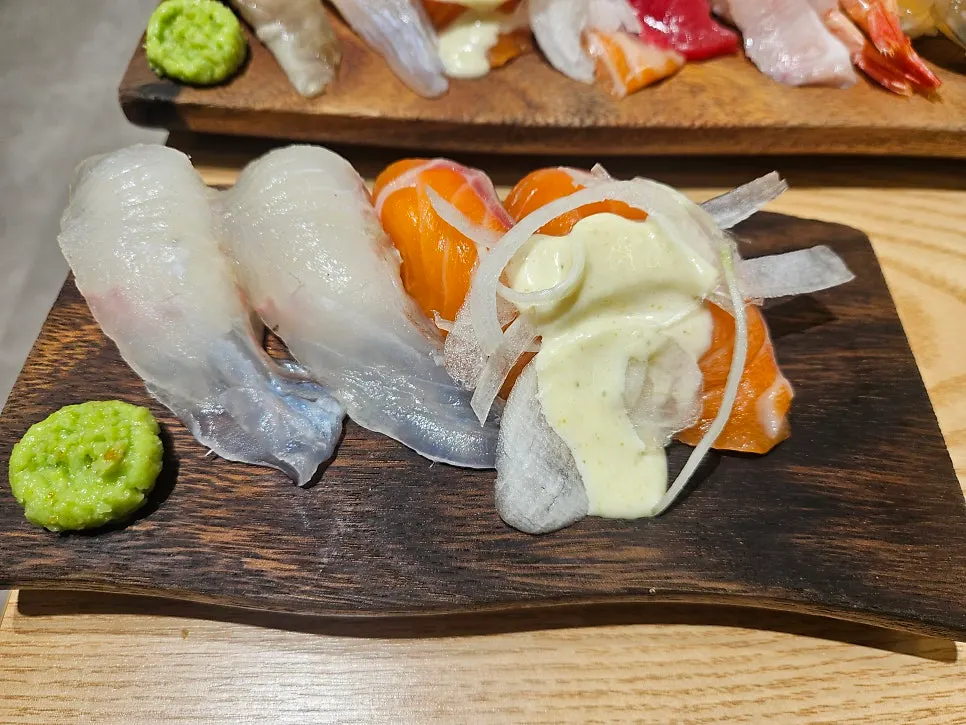 Added two pieces each of flounder and salmon sushi