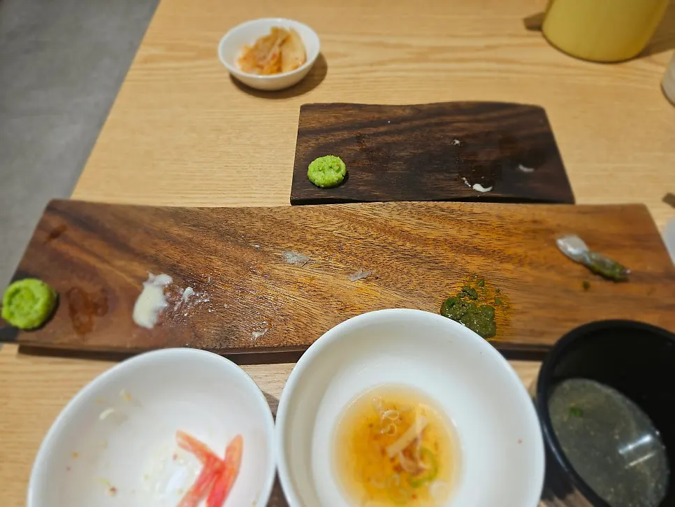 A meal with omakase and individual sushi orders